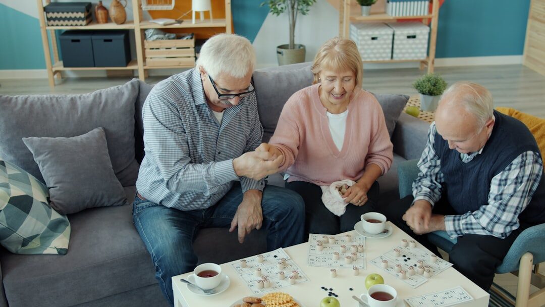 group of seniors playing cards